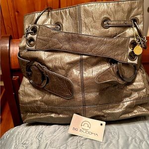 Big Buddha Silver Shoulder bag bought at a boutique.